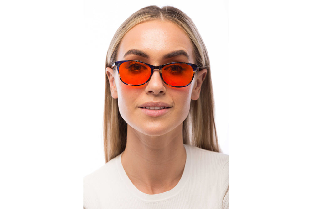 Woman Wearing Galaxy Blue Light Blocking Glasses Readers