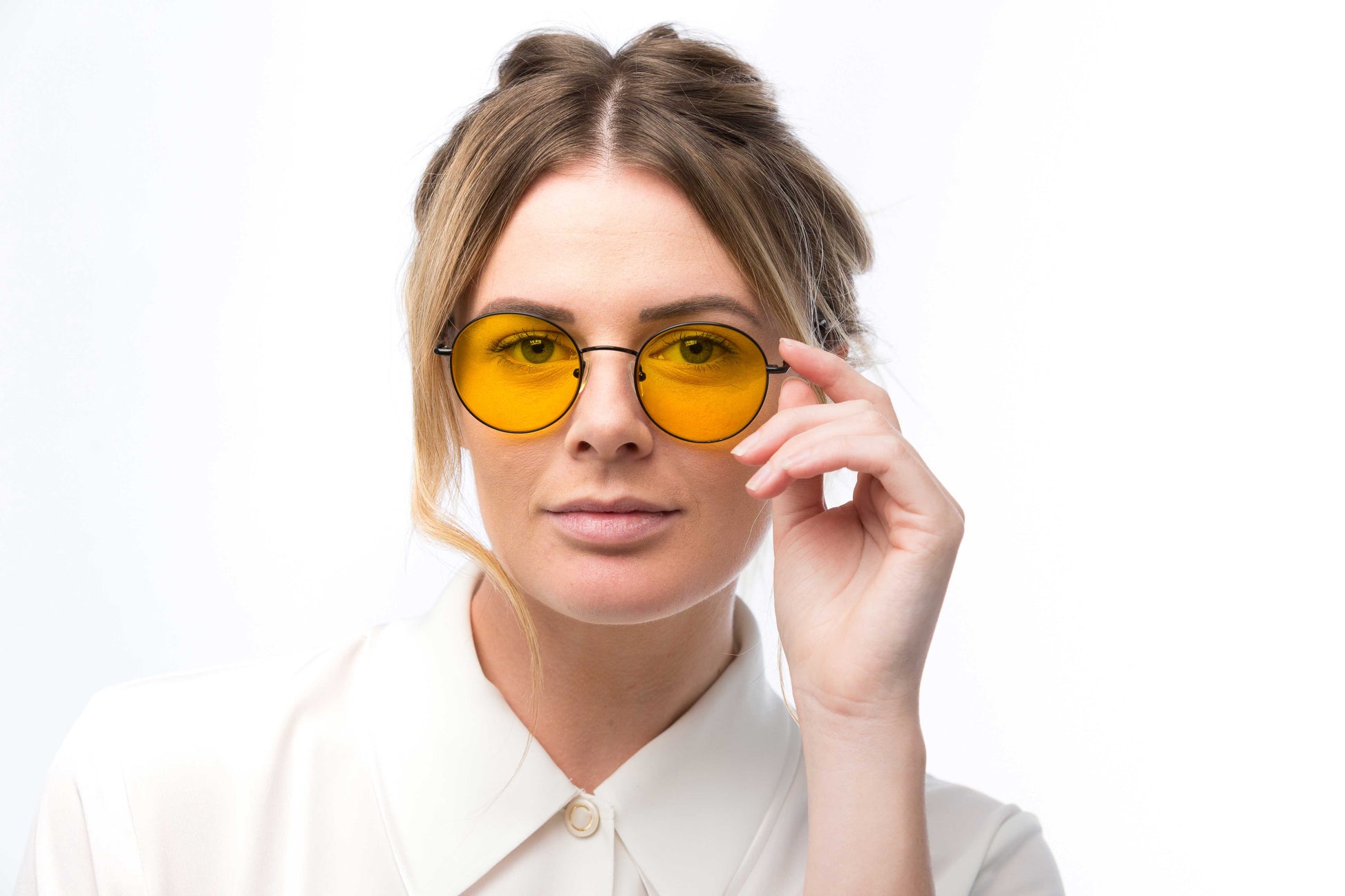 Woman Wearing Lennon Light Sensitivity Glasses